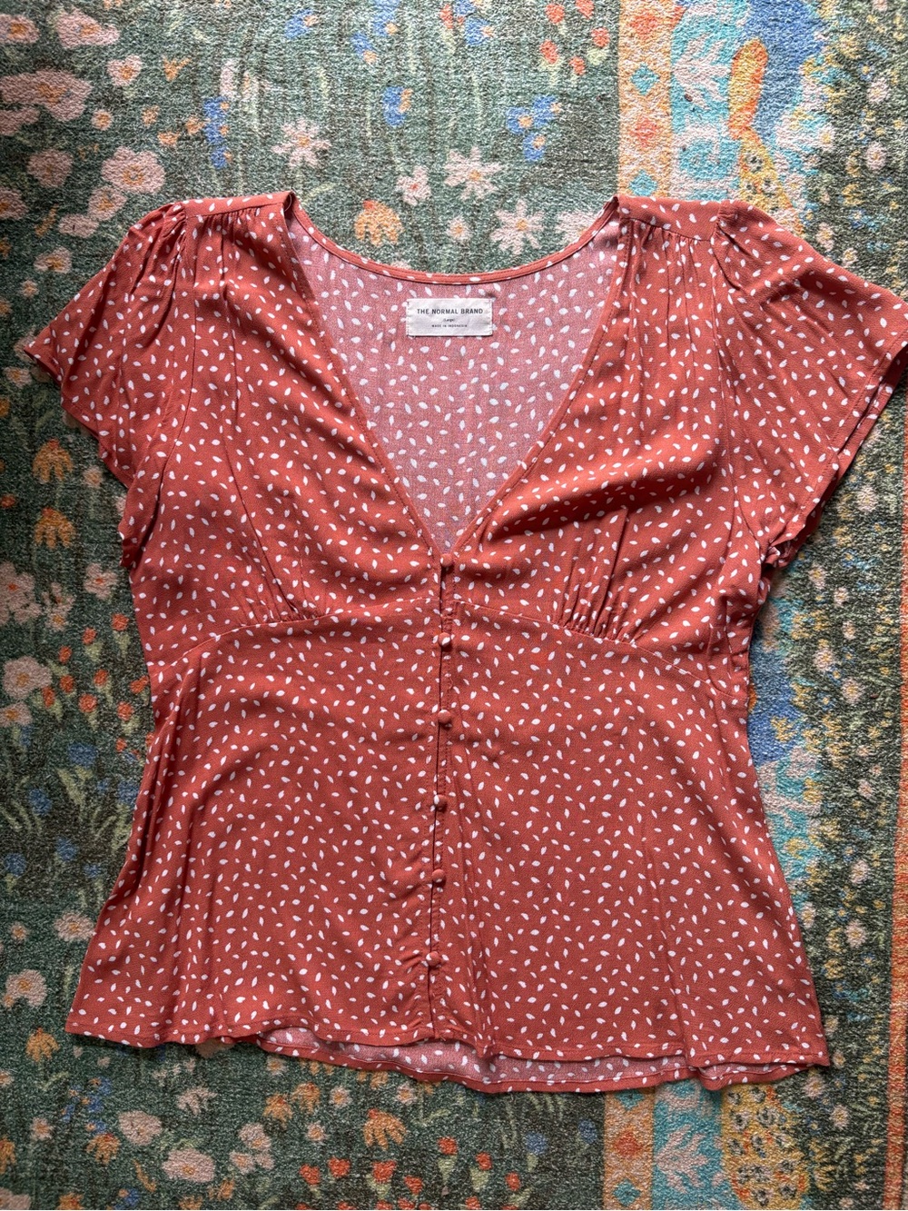 The Normal Brand terracotta dot button down blouse